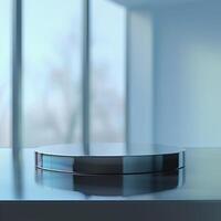 A table with a silver object on top photo