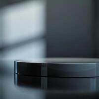 A black circular object sitting on top of a table photo