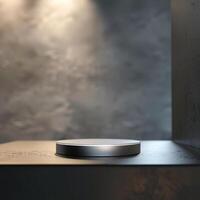 A silver object on a table in front of a wall photo