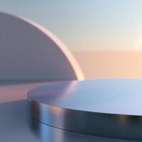 A round table with a silver surface in front of a sunset photo