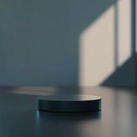 A black object sitting on a table in front of a window photo