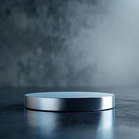 A silver object on a table with a dark background photo
