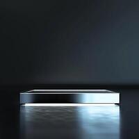 A silver rectangular table with a light shining on it photo