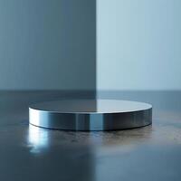A round object sitting on a table in front of a wall photo