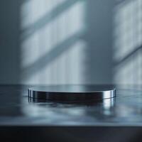 A black table with a round object on it photo
