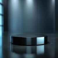 Black round podium on a dark floor with light photo