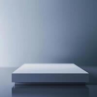A white box sitting on a table in front of a gray wall photo