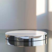 A round object on a table with a window in the background photo