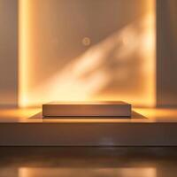 An empty box sitting on a table in front of a wall photo