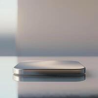 A square shaped device sitting on a table photo