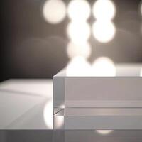 A clear acrylic block on a table with lights photo