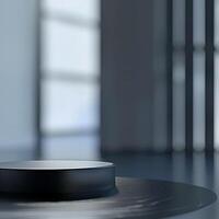 A black object on top of a table in a room photo