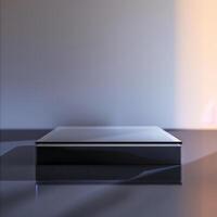 A black box sitting on a table with a light shining on it photo