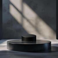 A black circular object on top of a table photo