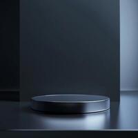 A black round object on a table in front of a wall photo