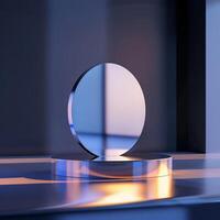 A shiny object on a table in front of a window photo