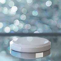 A white object on a table in front of a blurred background photo
