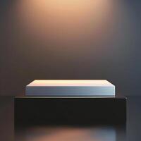An empty box on a table in front of a spotlight photo
