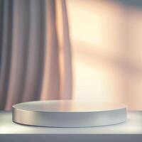 Round podium on a table with a curtain in the background photo