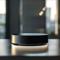 A black circular object sitting on top of a table photo