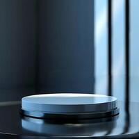 An empty round table on a black surface photo