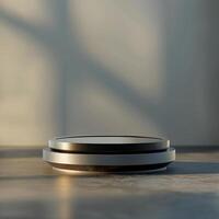 A black and white circular object sitting on a table photo