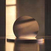 A round object on a table in front of a window photo