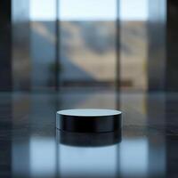 A black round object sitting on a table in front of a large window photo