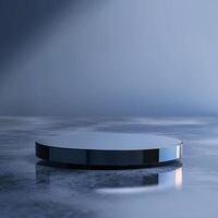A round table with a black surface on a concrete floor photo