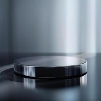 A black and silver circular object on a table photo