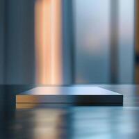 A white box sitting on a table in front of a window photo