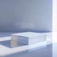 A white box sitting on a table in front of a window photo