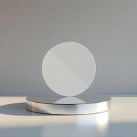 A white round object on a pedestal in front of a light photo