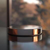 A round object sitting on a table with a window in the background photo