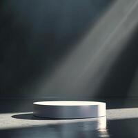 An empty white podium in front of a wall photo