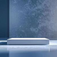 An empty white box sitting on a table in front of a wall photo