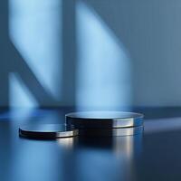 Two silver coins on a table in front of a window photo