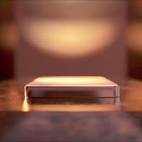 A close up of a phone sitting on a table photo