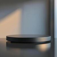 A black circular object on a table photo