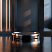 An empty metal table with a light shining on it photo