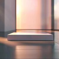A white box sitting on the floor in front of a large window photo