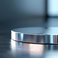 A silver circular object on a table photo