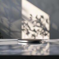 A white table with a black object on it photo
