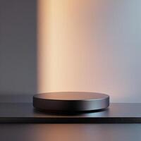 A black round table on a table with a light shining on it photo