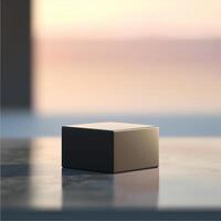 A cube sitting on a table in front of a window photo