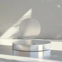 A white circular object on a table with a shadow photo