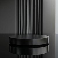Black round pedestal on a black table with a curtain photo
