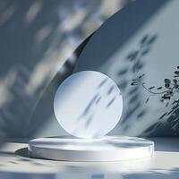 A white sphere on a pedestal in front of a plant photo