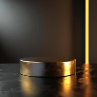 A golden round object on a table in front of a dark background photo
