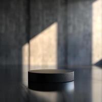A black object sitting on a table in front of a wall photo